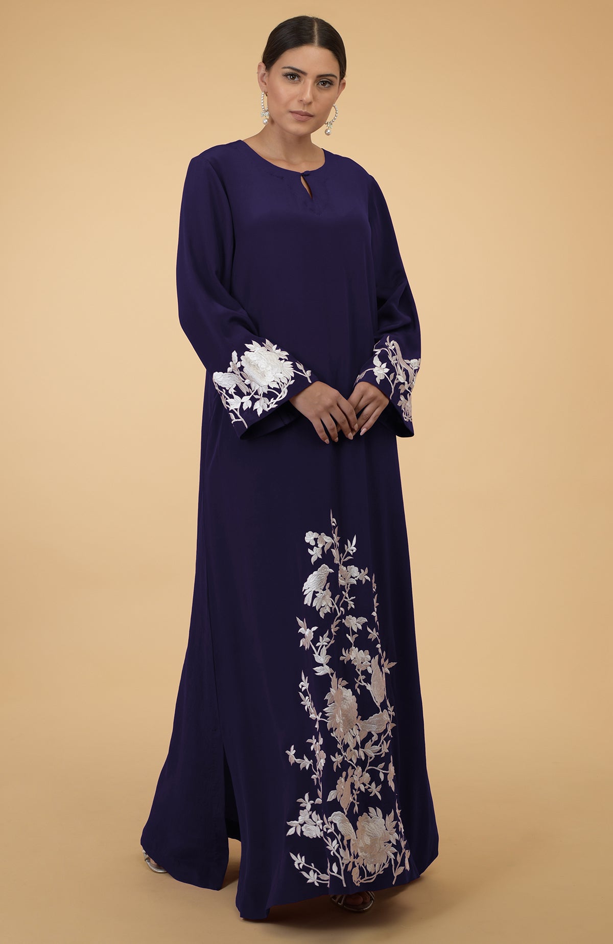 Eclipse blue silk crepe kaftan with floral and bird embroidery.