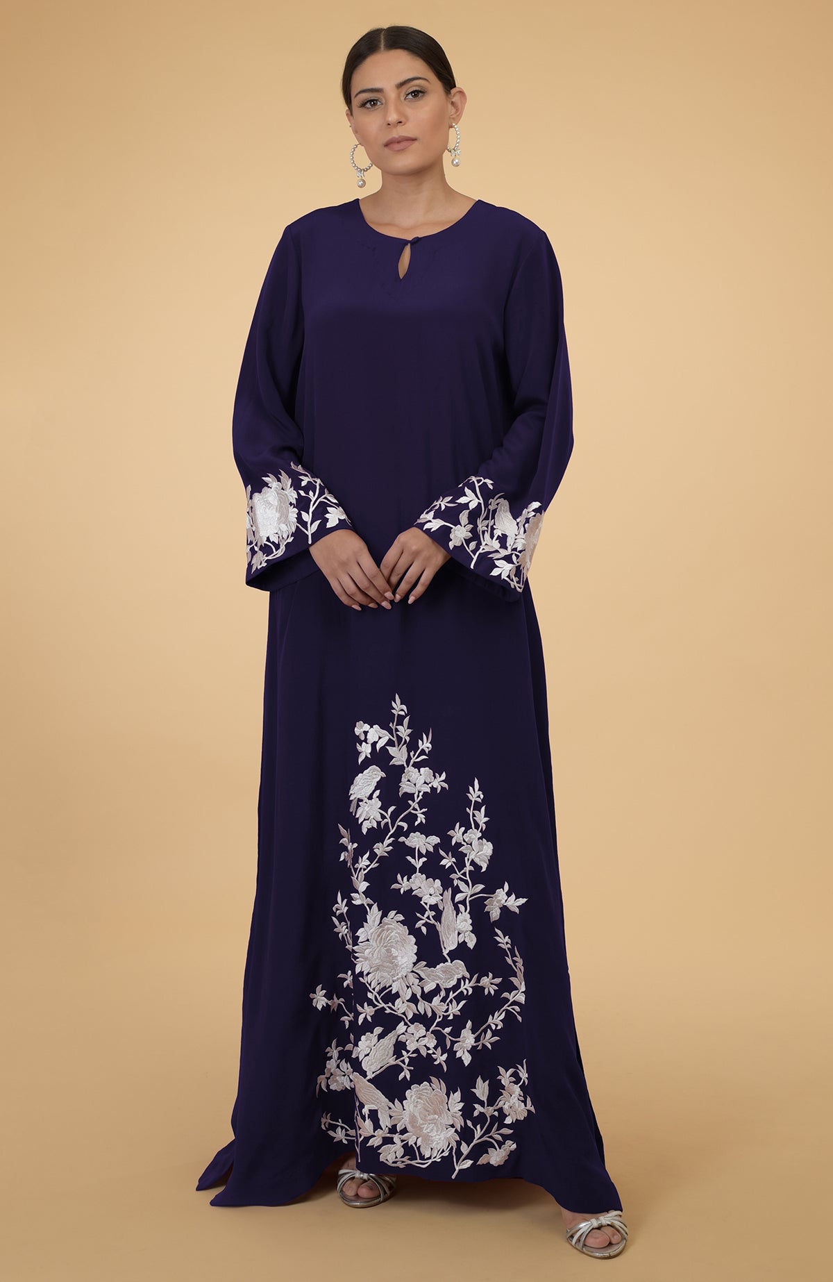Eclipse blue silk crepe kaftan with floral and bird embroidery.