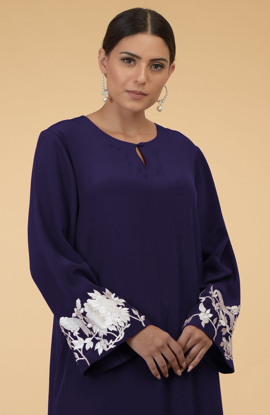 An Eclipse Blue Floral & Birds Embroidered Kaftan with a keyhole neckline.