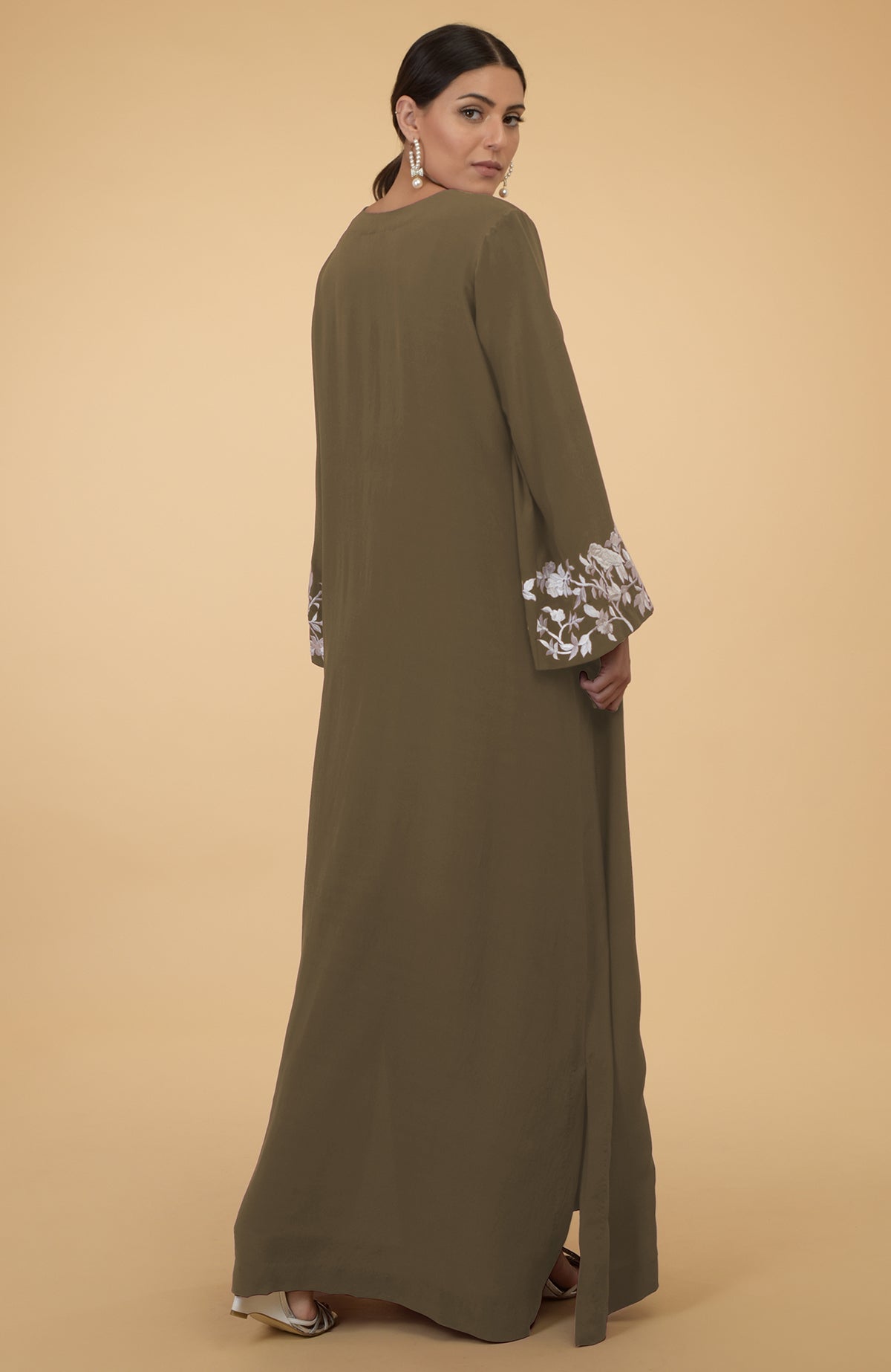 Olive floral and birds embroidered kaftan with a round neck and full sleeves.