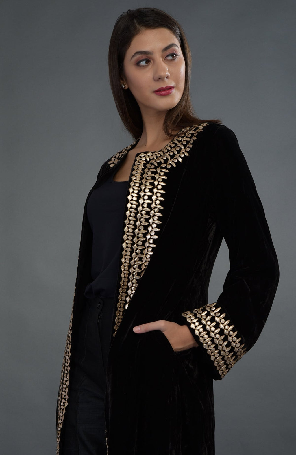 Black silk velvet jacket with rose gold gota patti embroidery.