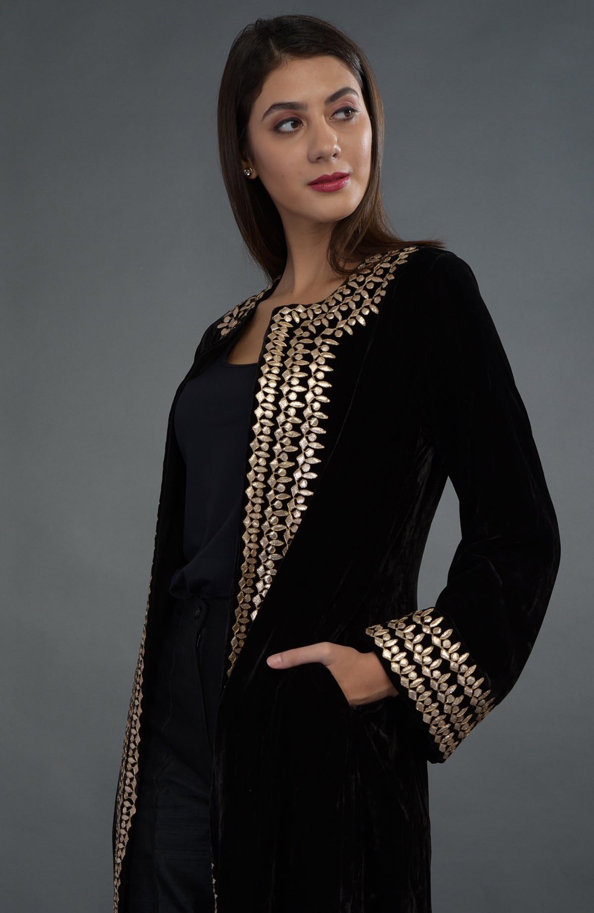 Black silk velvet jacket with rose gold gota patti embroidery.