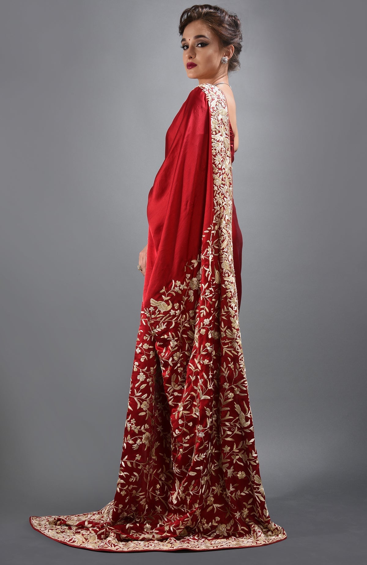 Red-beige Parsi Gara hand-embroidered saree with floral and bird motifs.