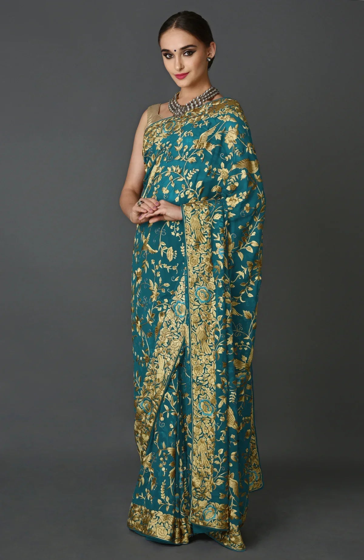 Indigo blue Parsi Gara hand embroidered saree with birds and floral motifs.