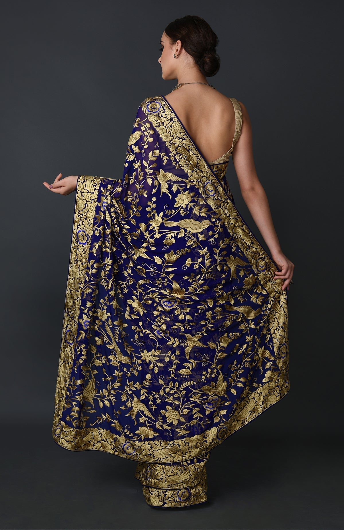 Indigo blue Parsi Gara hand embroidered saree with birds and floral motifs.
