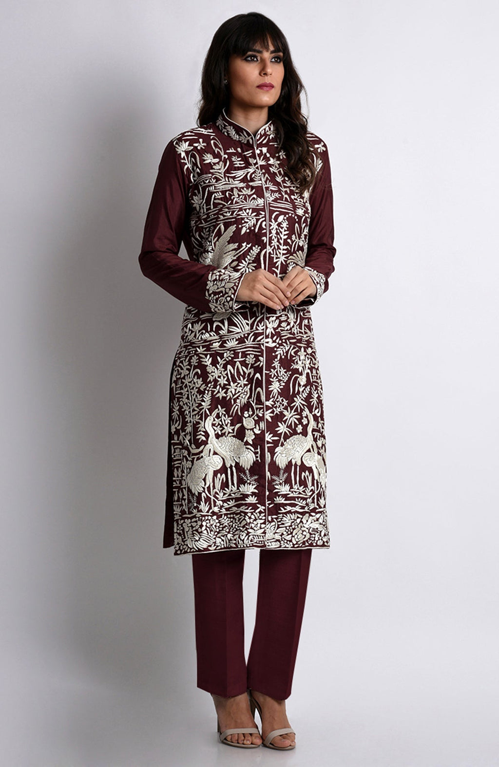 Maroon Parsi Gara embroidered jacket set with ivory floral and crane-bird embroidery.
