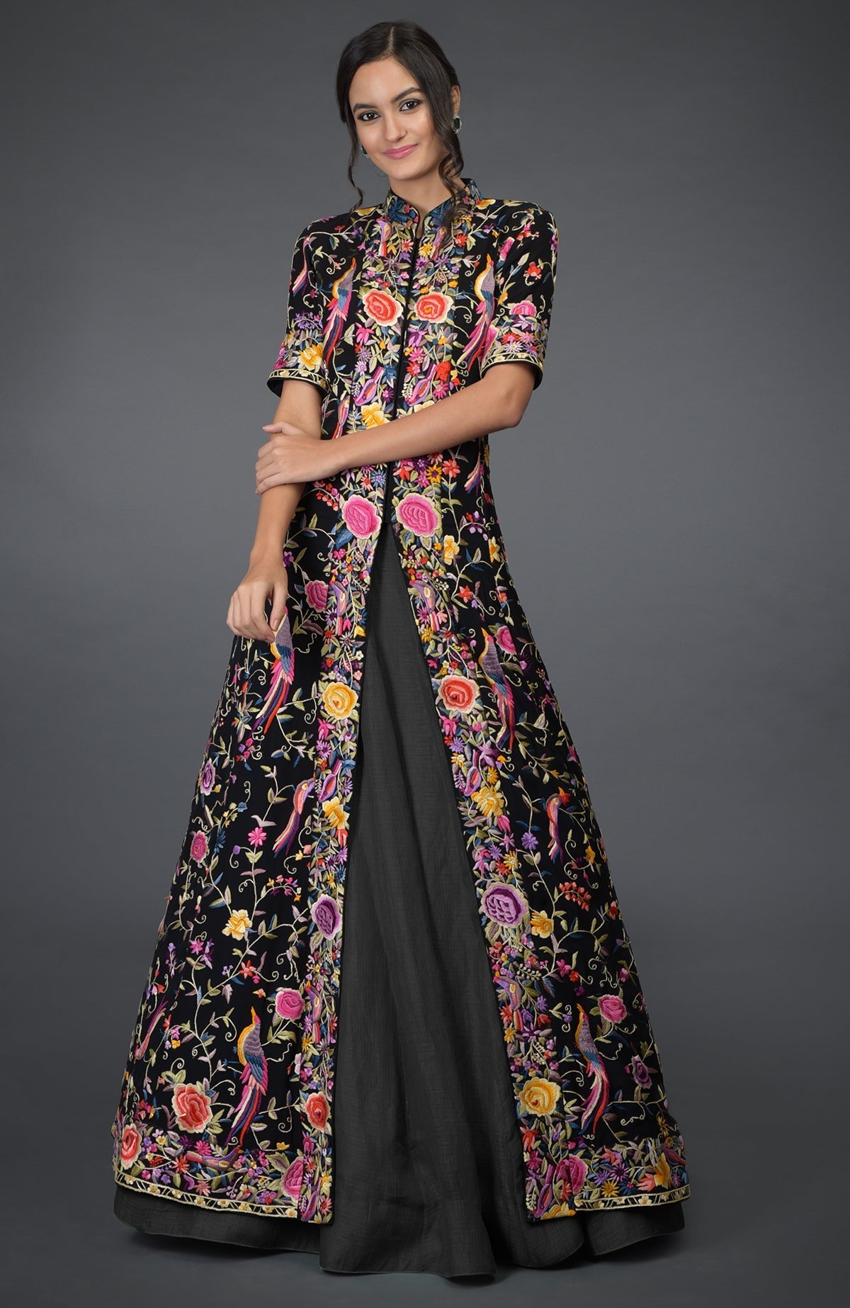 Black flared jacket with multicolor Parsi Gara embroidery paired with elephant grey skirt
