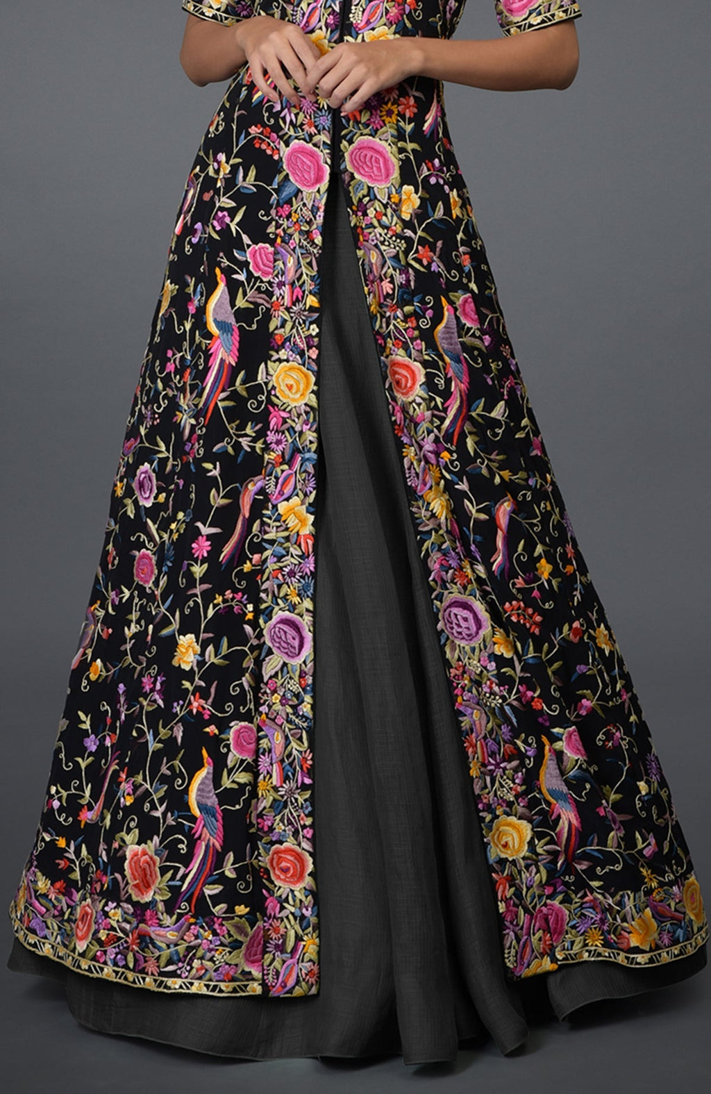 Black flared jacket with multicolor Parsi Gara embroidery paired with elephant grey skirt