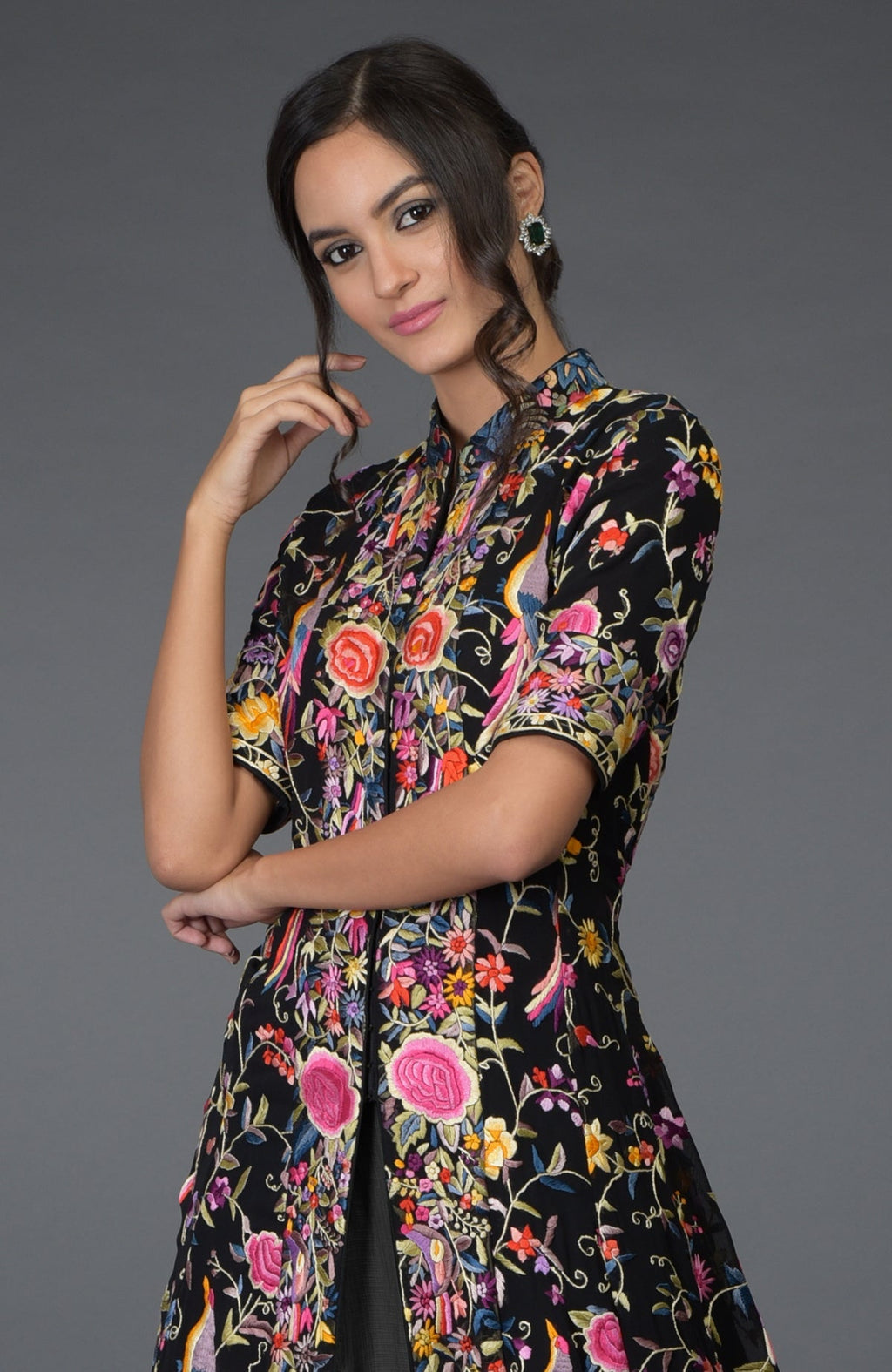Black flared jacket with multicolor Parsi Gara embroidery paired with elephant grey skirt