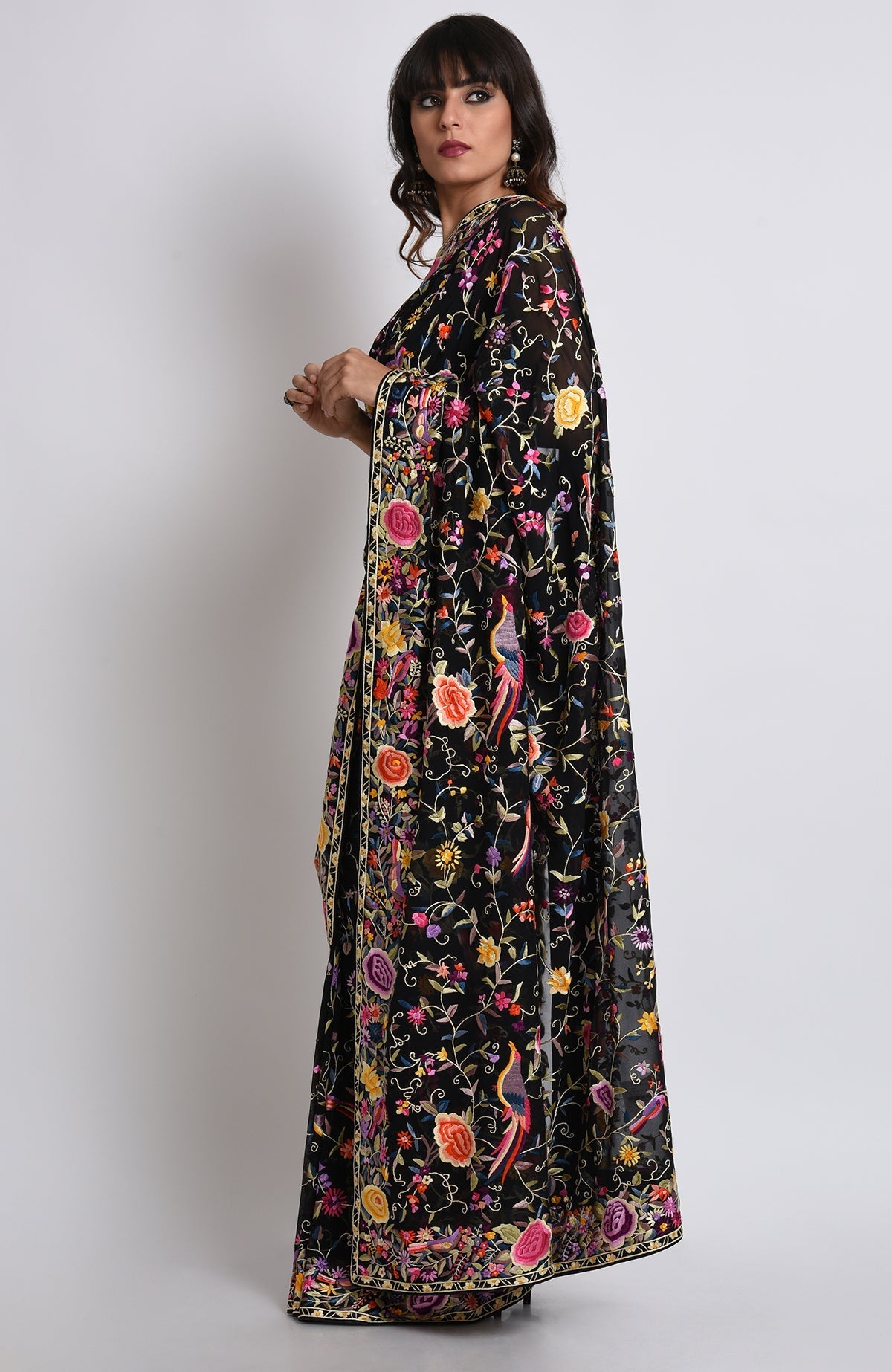 Black Parsi Gara hand-embroidered saree with colorful birds and floral patterns.