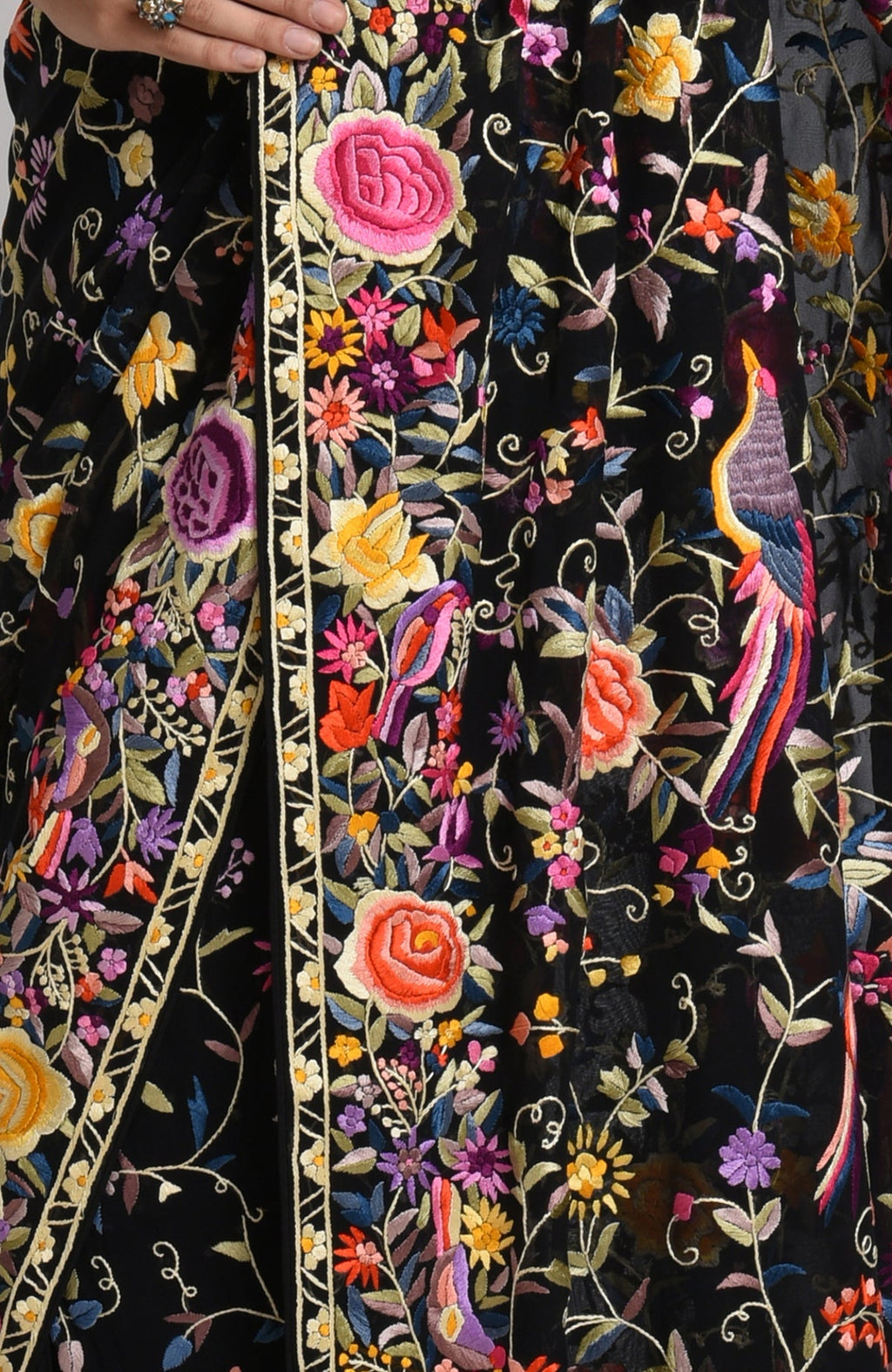 Black Parsi Gara hand-embroidered saree with colorful birds and floral patterns.