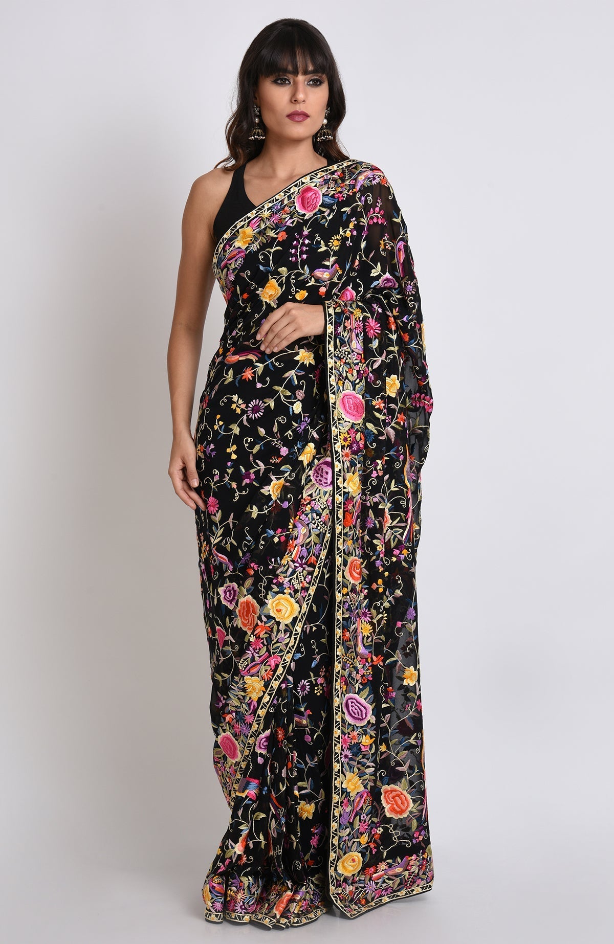 Black Parsi Gara hand-embroidered saree with colorful floral and bird motifs.