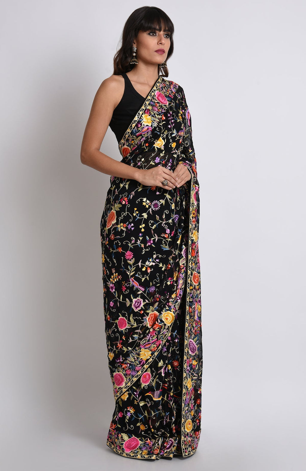 Black Parsi Gara hand-embroidered saree with colorful floral and bird motifs.