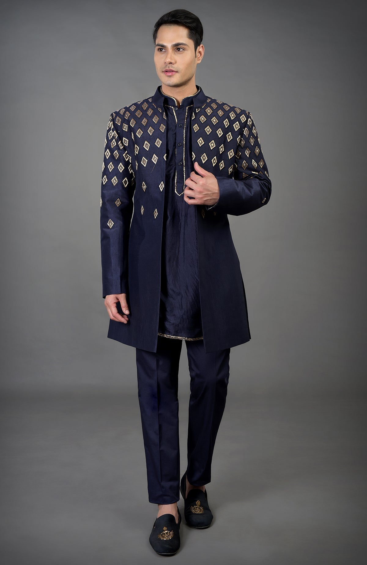 Blue Diamond Hand Embroidered Jacket Set with matching kurta and pants.