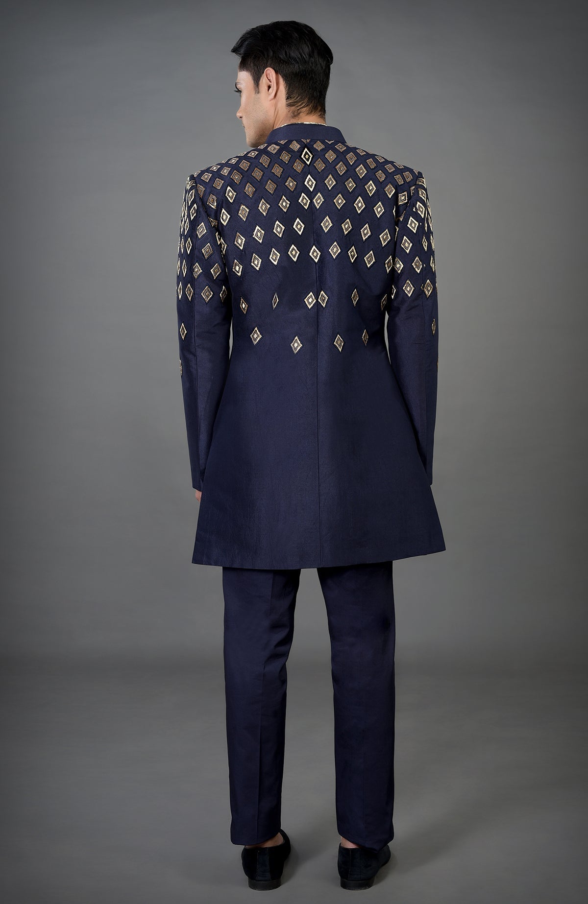 Blue jacket set with gold diamond hand embroidery.