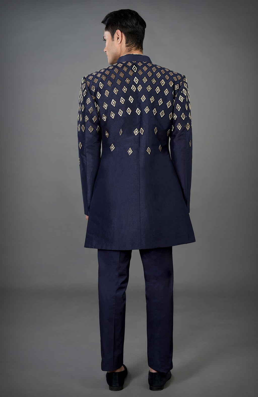 Blue jacket set with gold diamond hand embroidery.