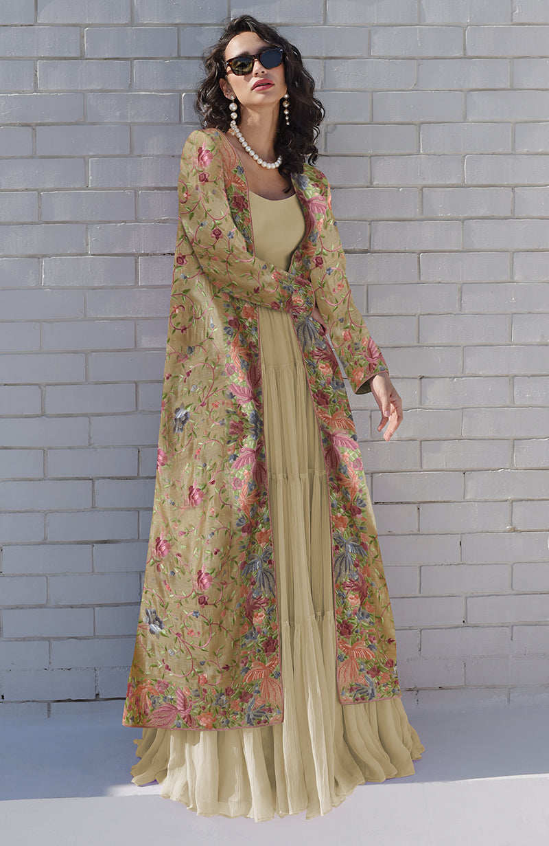 Beige Parsi Gara embroidered jacket set with a long floral jacket over a pleated dress.