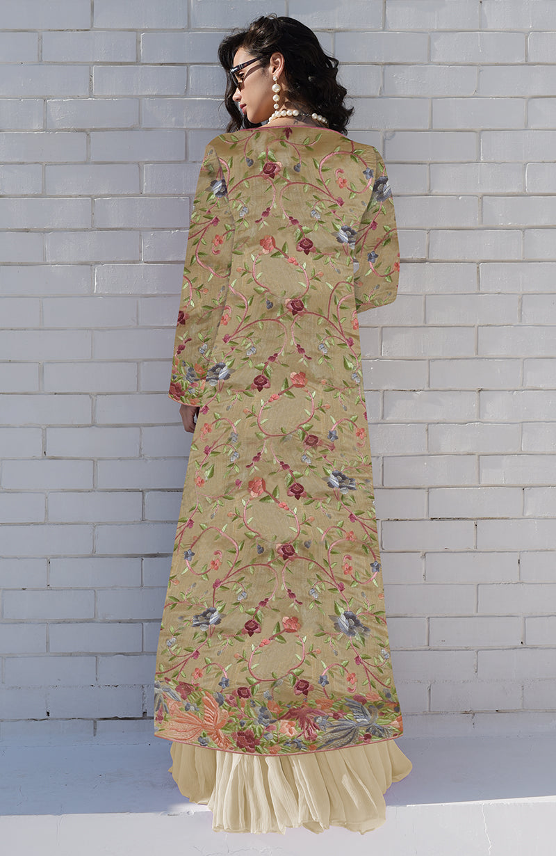 Beige Parsi Gara embroidered jacket set with a light beige pleated dress.
