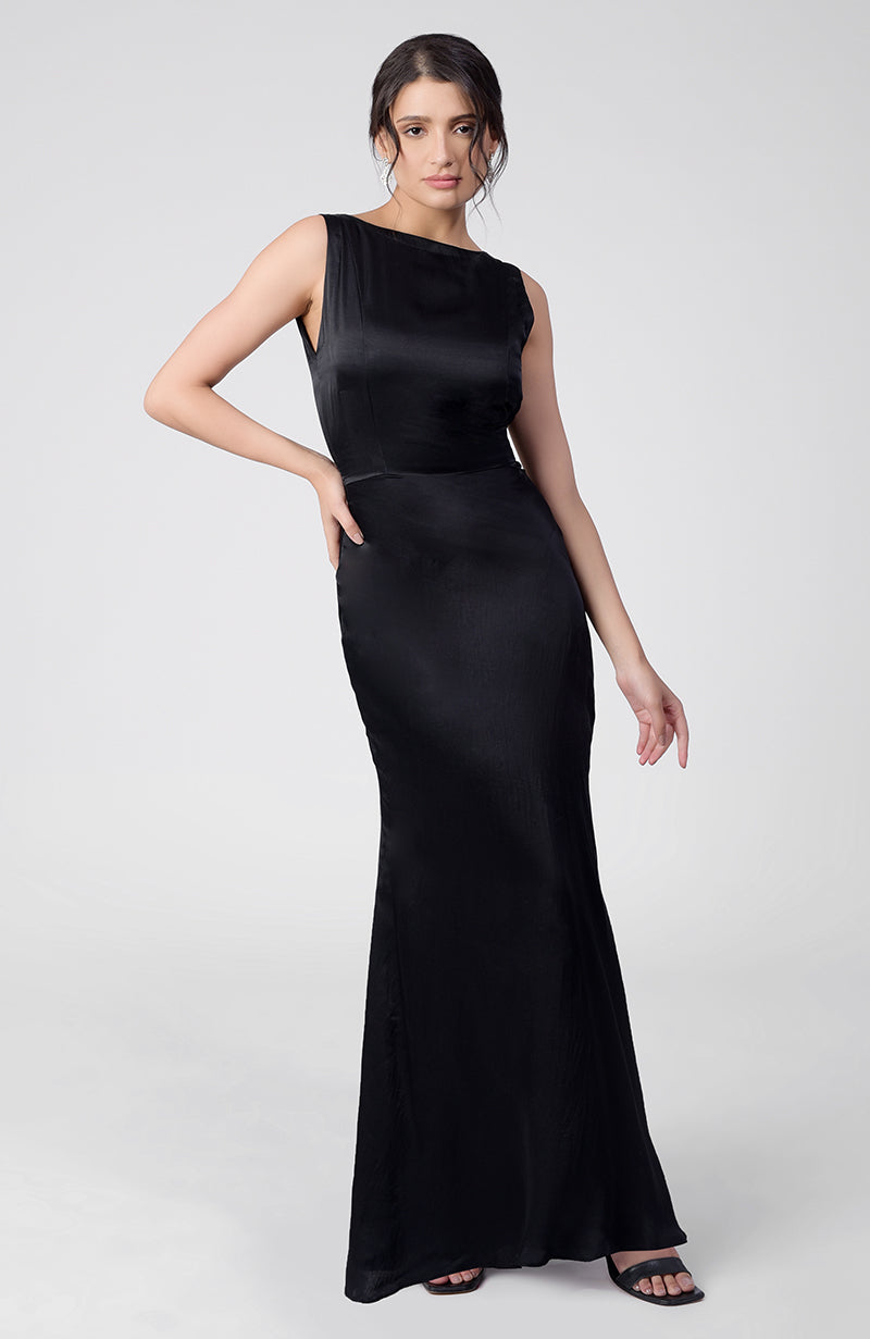 Classic black silk satin crepe gown with boat neckline and back pleated detail