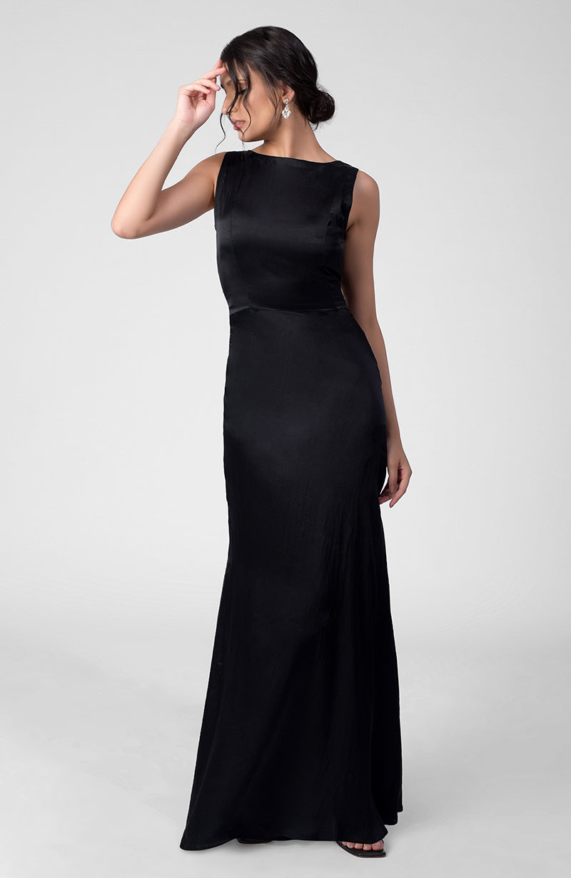 Black silk satin crepe gown with boat neckline and pleated open back detail