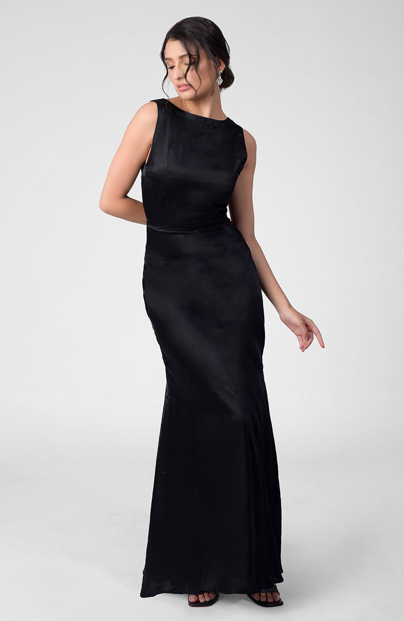 Classic black silk satin crepe gown with boat neckline and pleated open back detail
