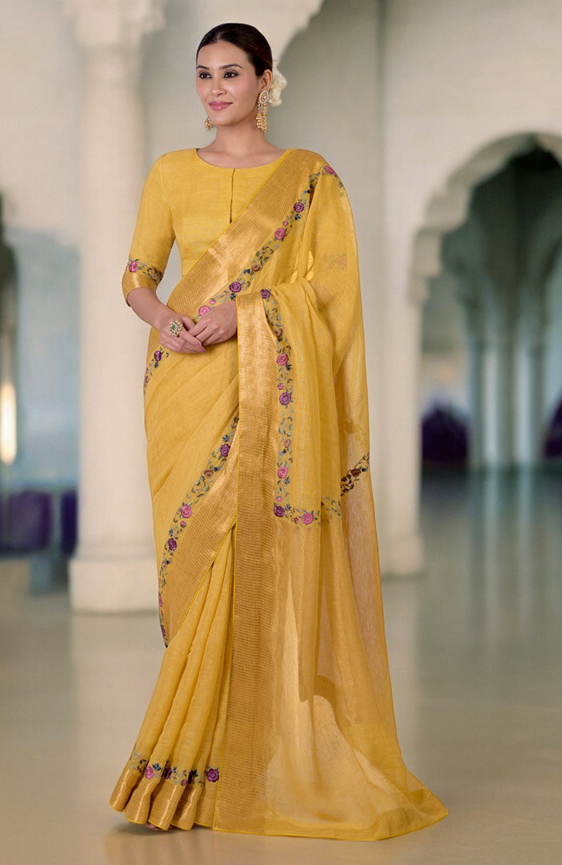 Calendula yellow linen saree with Parsi Gara embroidery and zari details.
