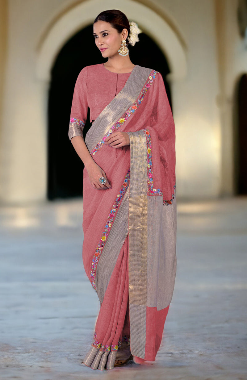 A woman models a Desert Rose Parsi Gara embroidered linen saree.