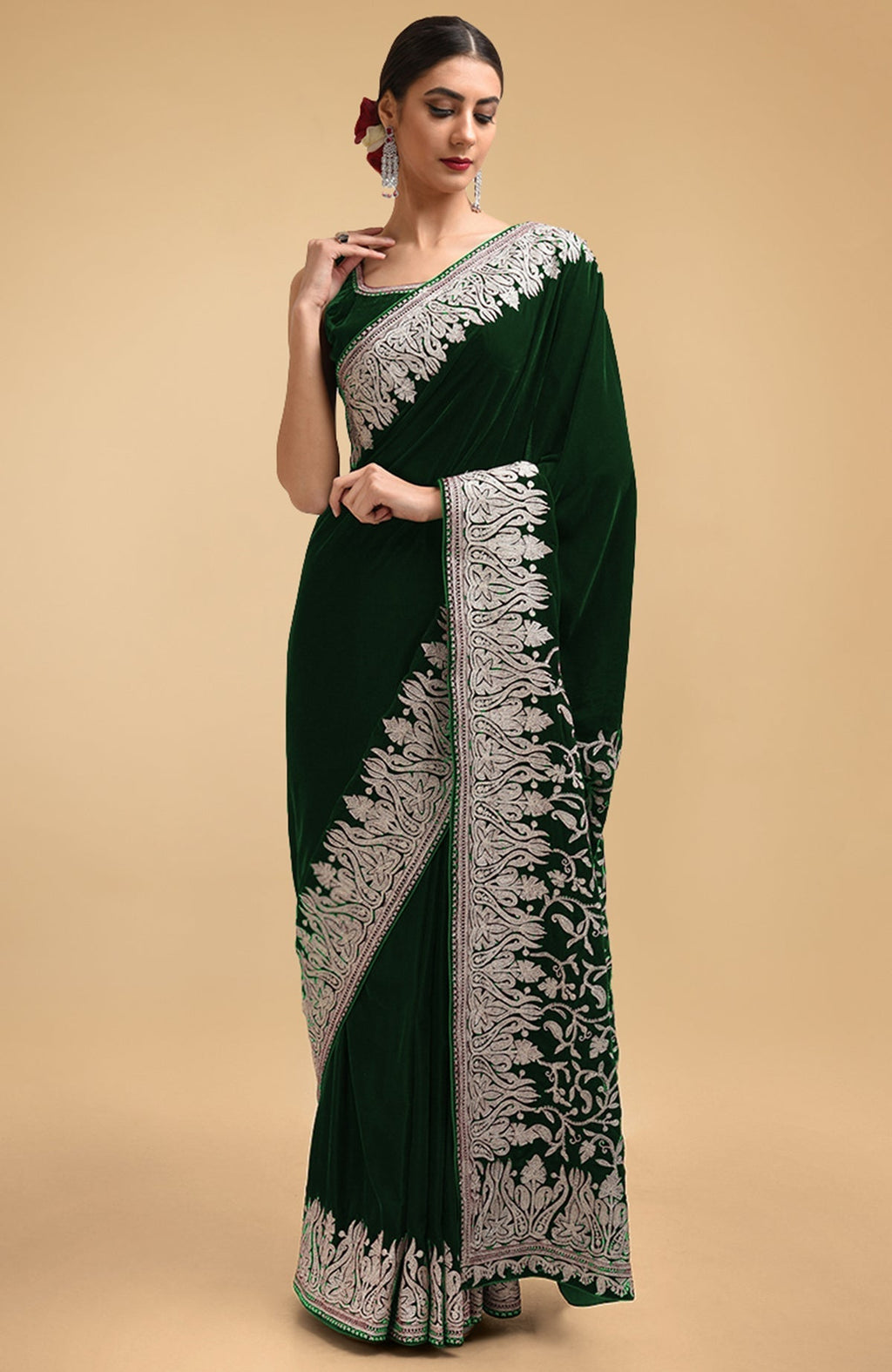 Bottle green velvet saree with silver Kashmiri tilla aari embroidery on borders and pallav.