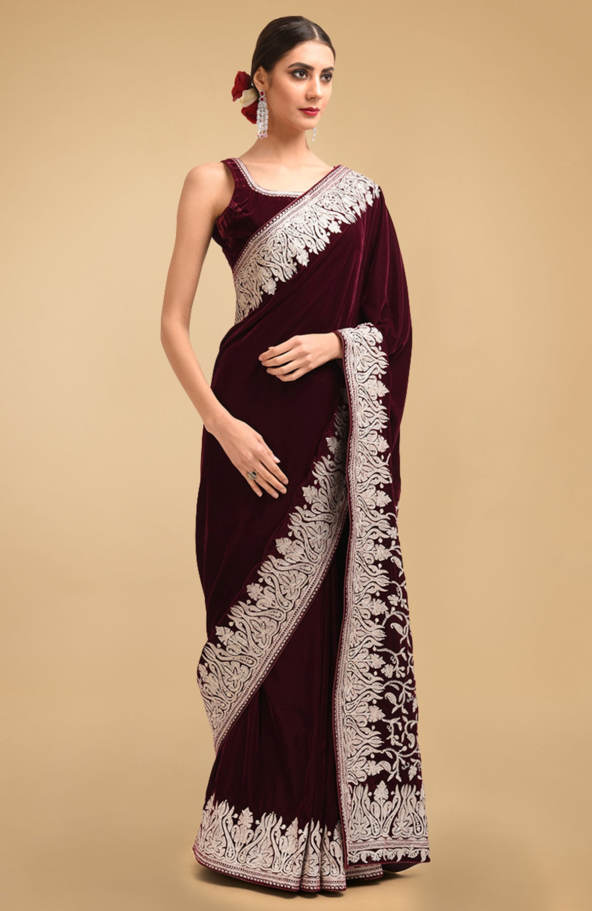 Bottle green velvet saree with silver Kashmiri tilla aari embroidery on borders and pallav