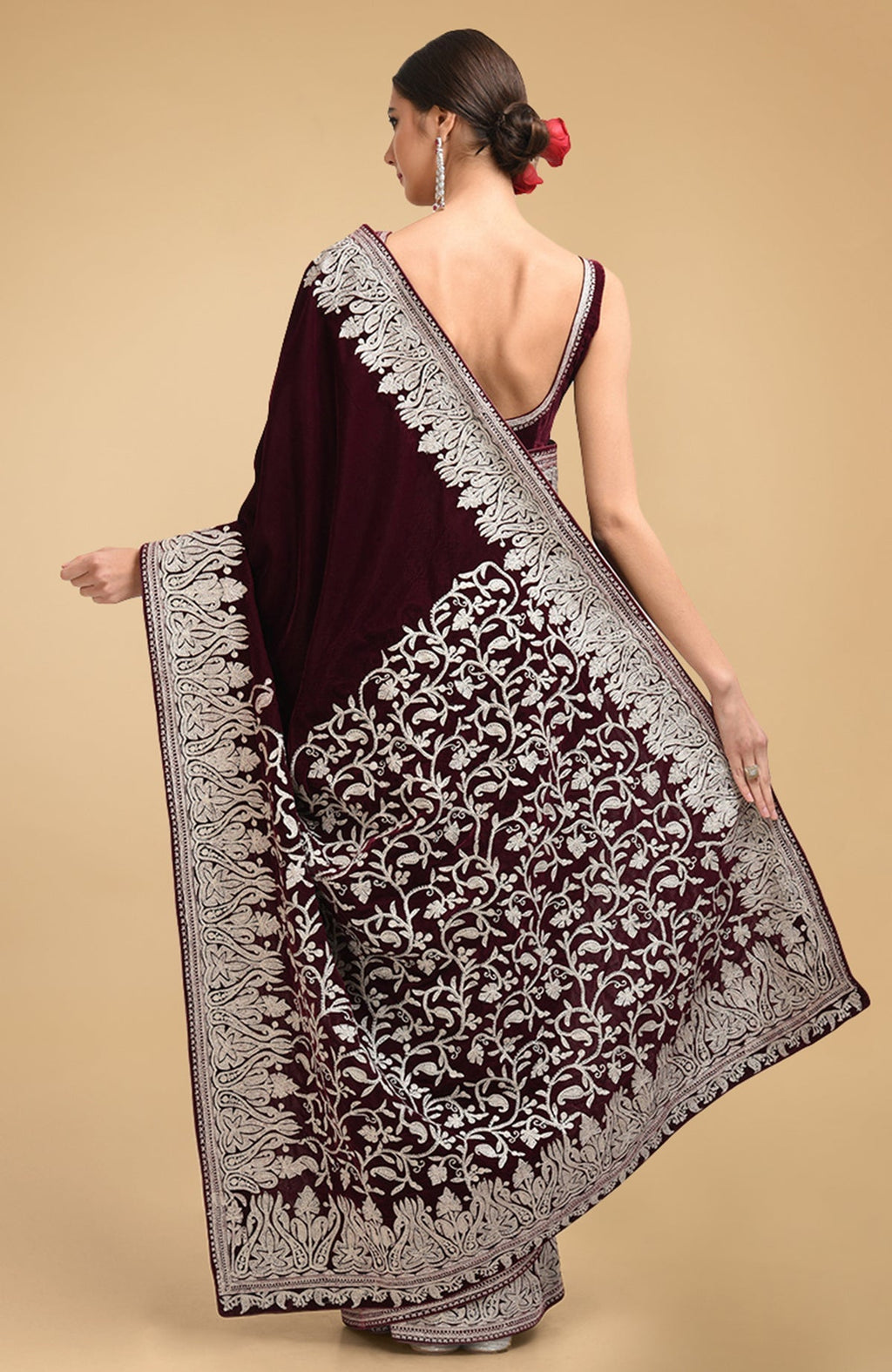 Plum velvet saree with Kashmiri silver tilla aari embroidery.