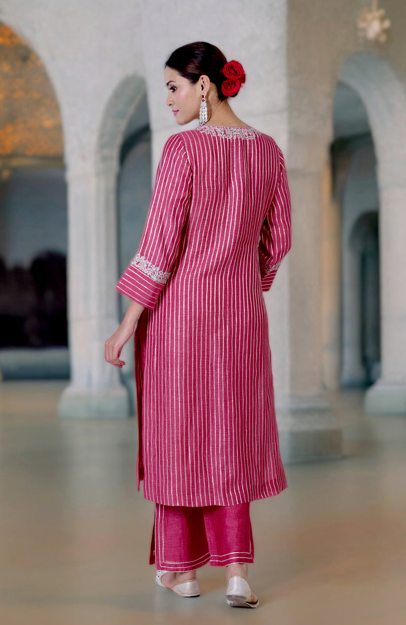 Pink Yarrow Gota & Tilla Embroidered Silk Linen Suit with vertical stripes.