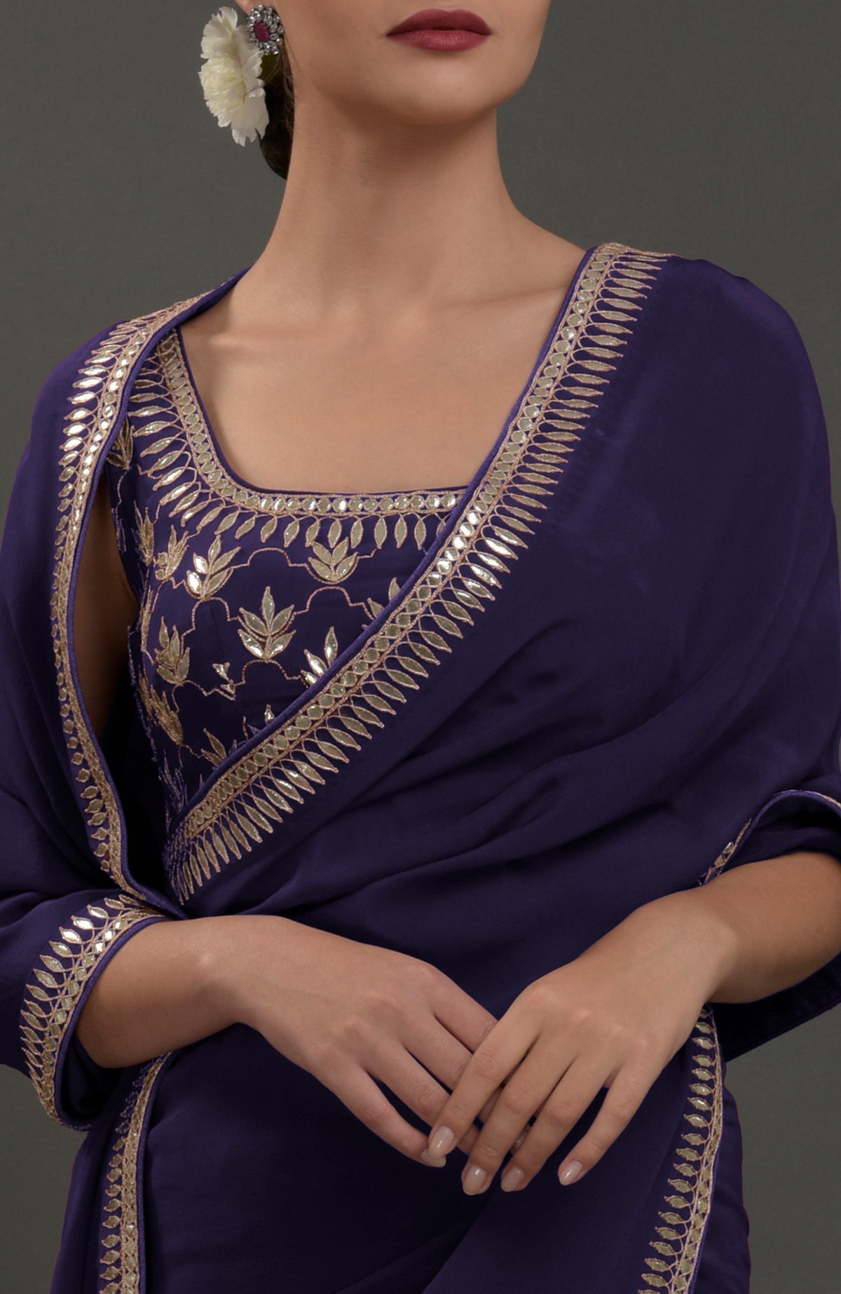 Eclipse blue crepe saree with intricate silvery gold gota patti embroidery.