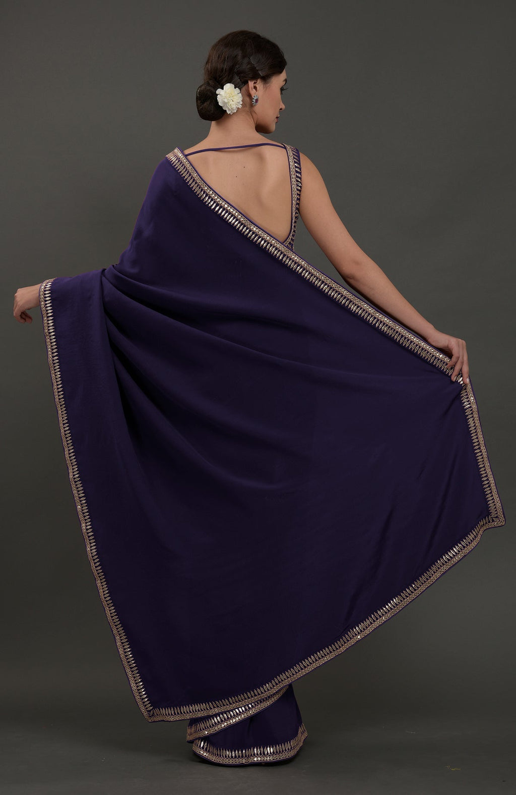 Eclipse blue crepe saree with silvery gold gota patti embroidery.