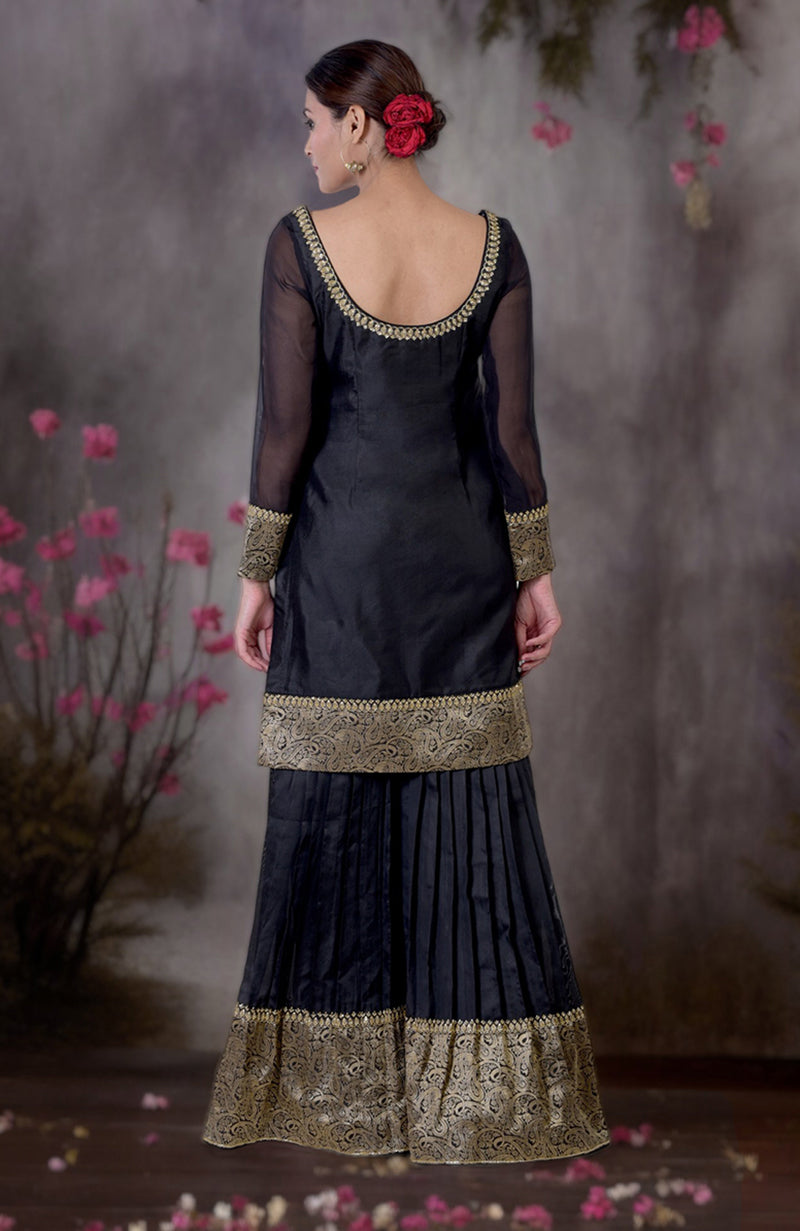 Black-Gold Banarasi Embroidered Sharara Set with a pleated sharara.
