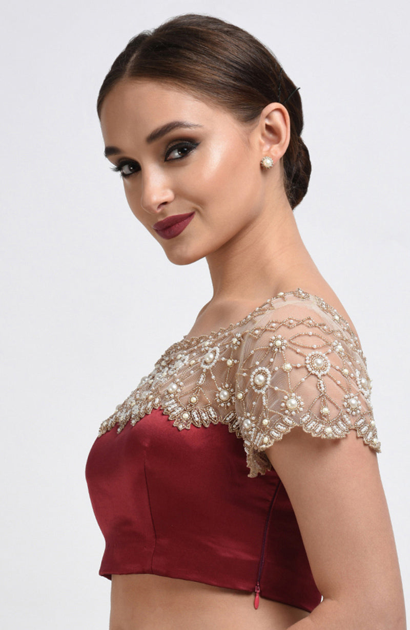 Maroon pure satin silk blouse with pearl hand-embroidered net yoke and sleeves.