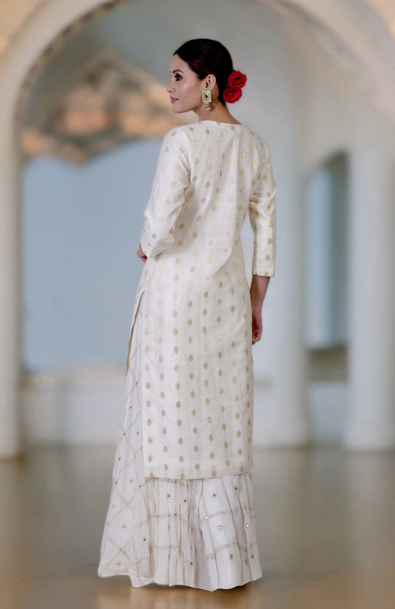 Ivory Banarasi kurta with gold bootah and aari tilla embroidered sharara set.