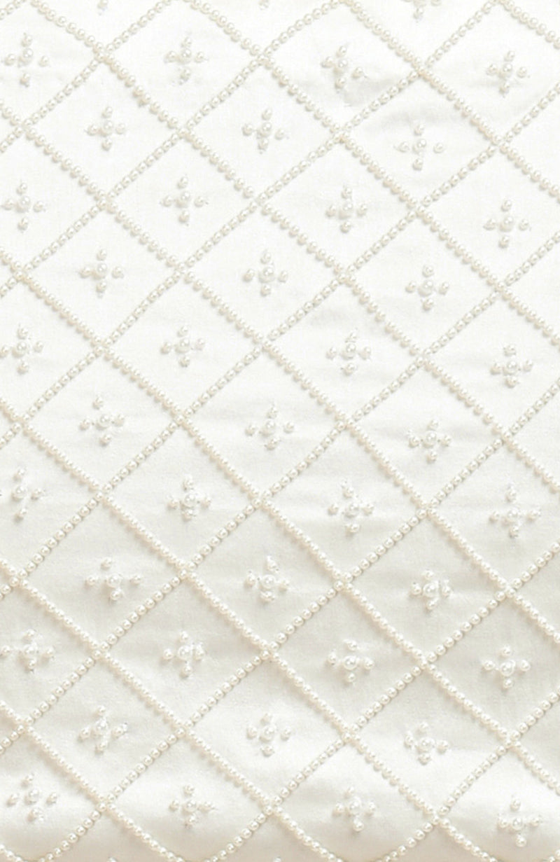 Ivory pearl beaded hand embroidered blouse with a lattice pattern.