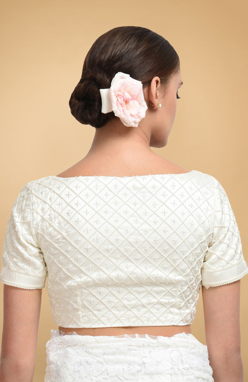 Ivory pearl beaded hand embroidered blouse with a square neckline and short sleeves.