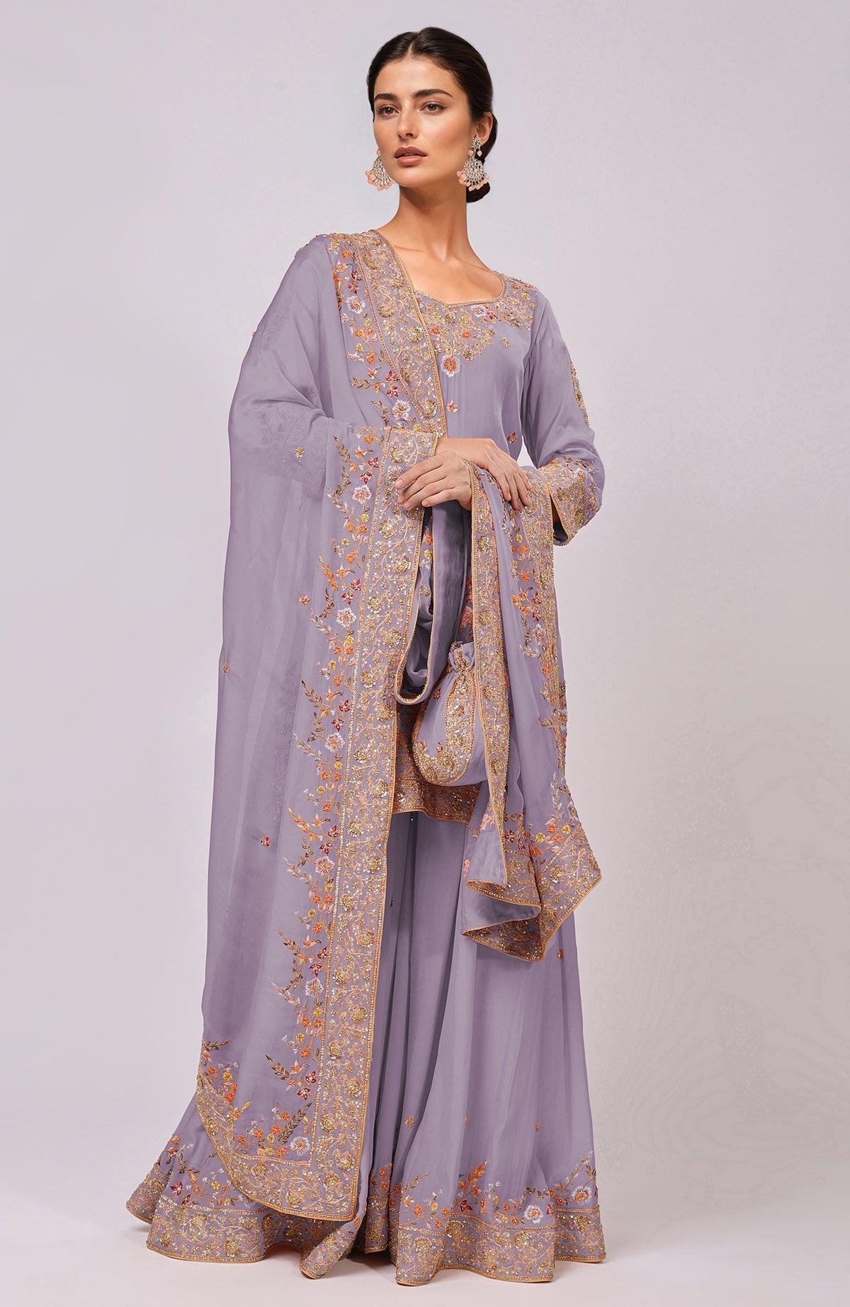 A woman models an Elder Berry Marori and Resham Hand Embroidered Sharara Set.