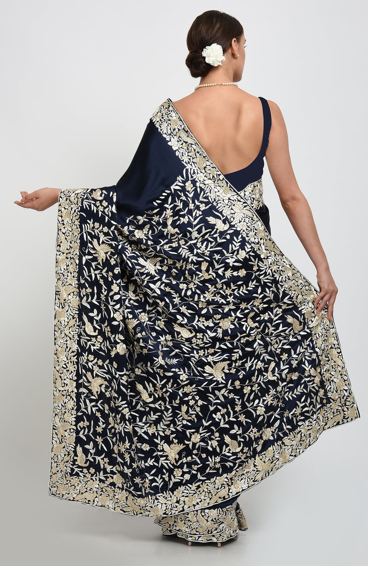 Navy blue-beige Parsi Gara hand embroidered saree with floral and bird motifs.