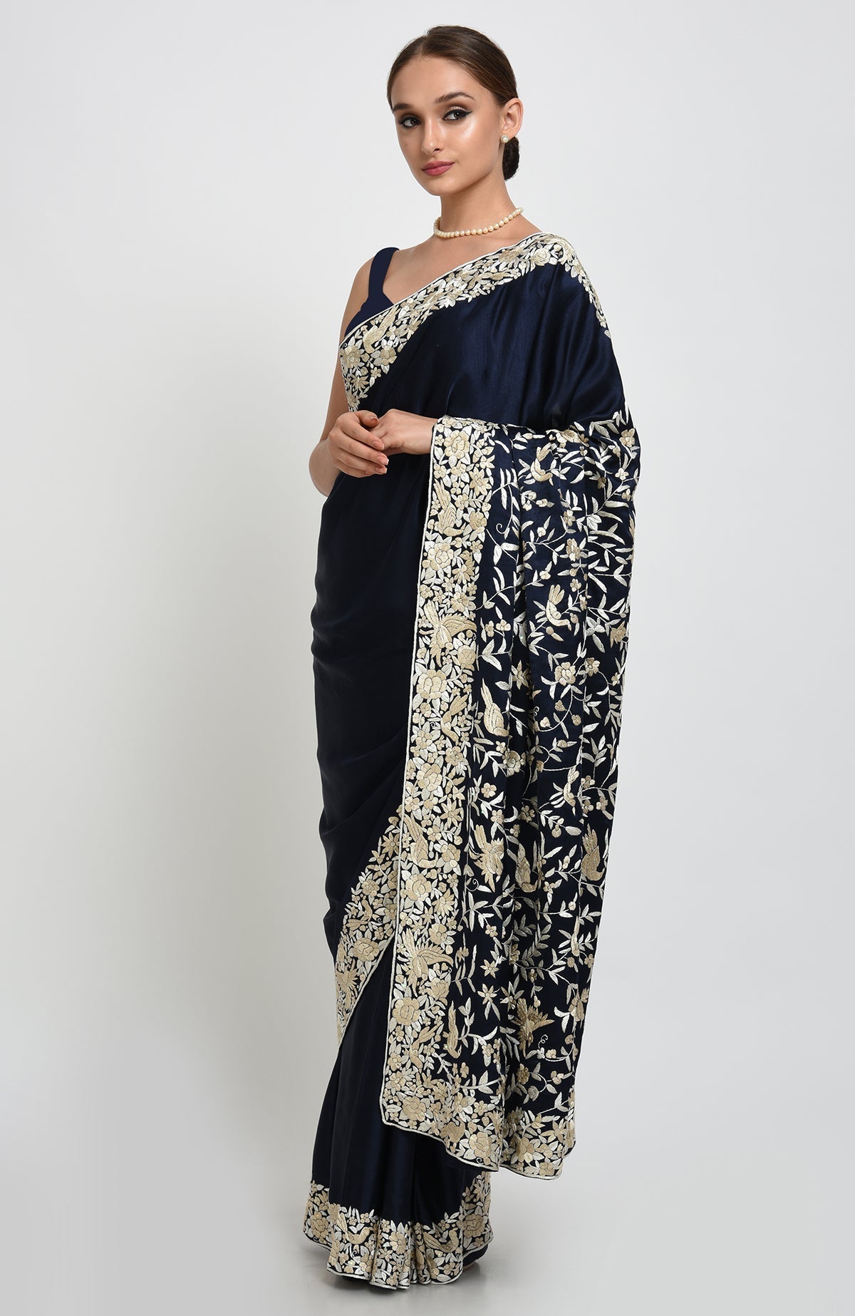 Navy blue-beige Parsi Gara hand embroidered saree with floral and bird motifs.