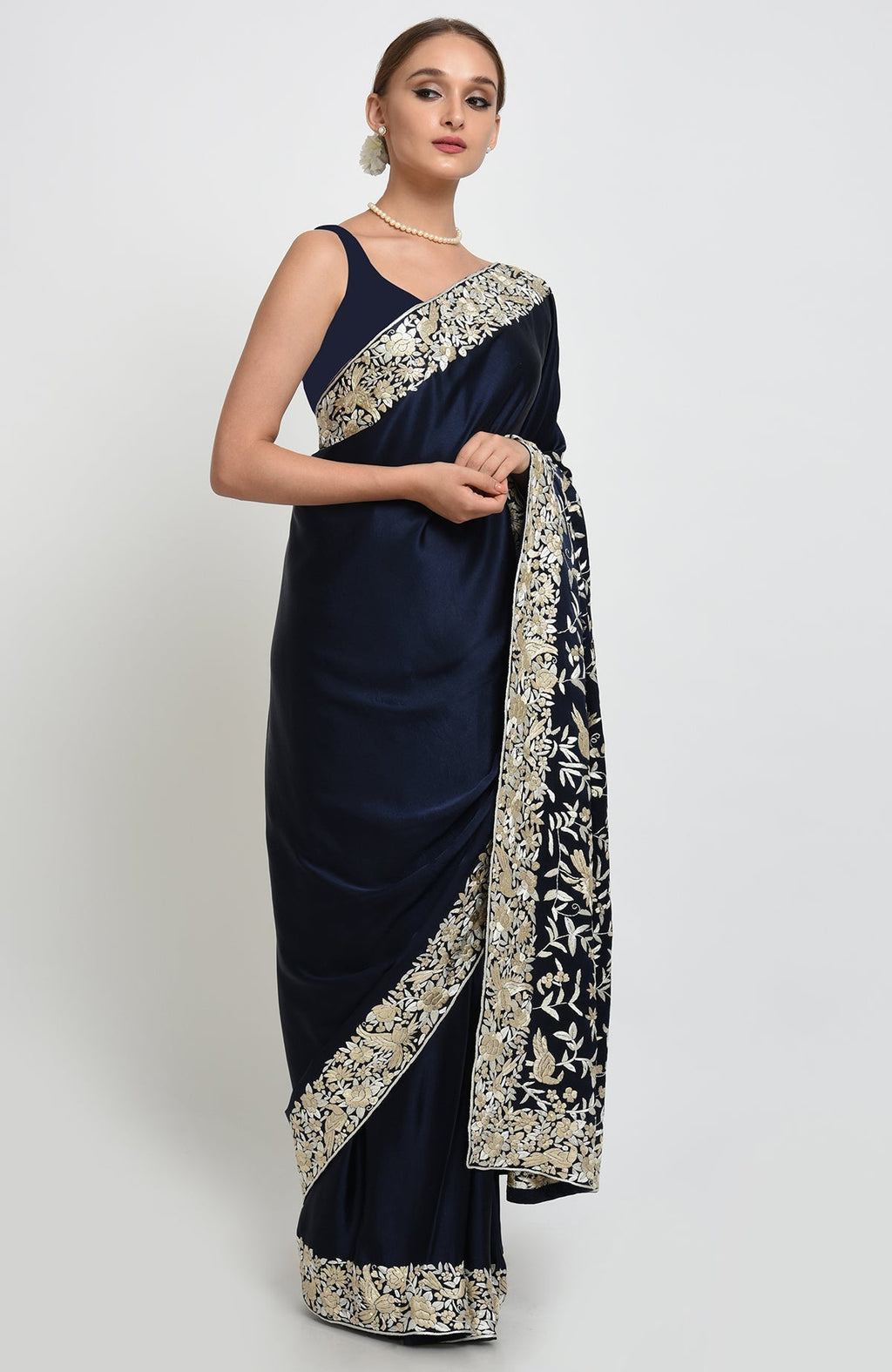 Navy blue-beige Parsi Gara hand embroidered saree with floral and bird motifs.