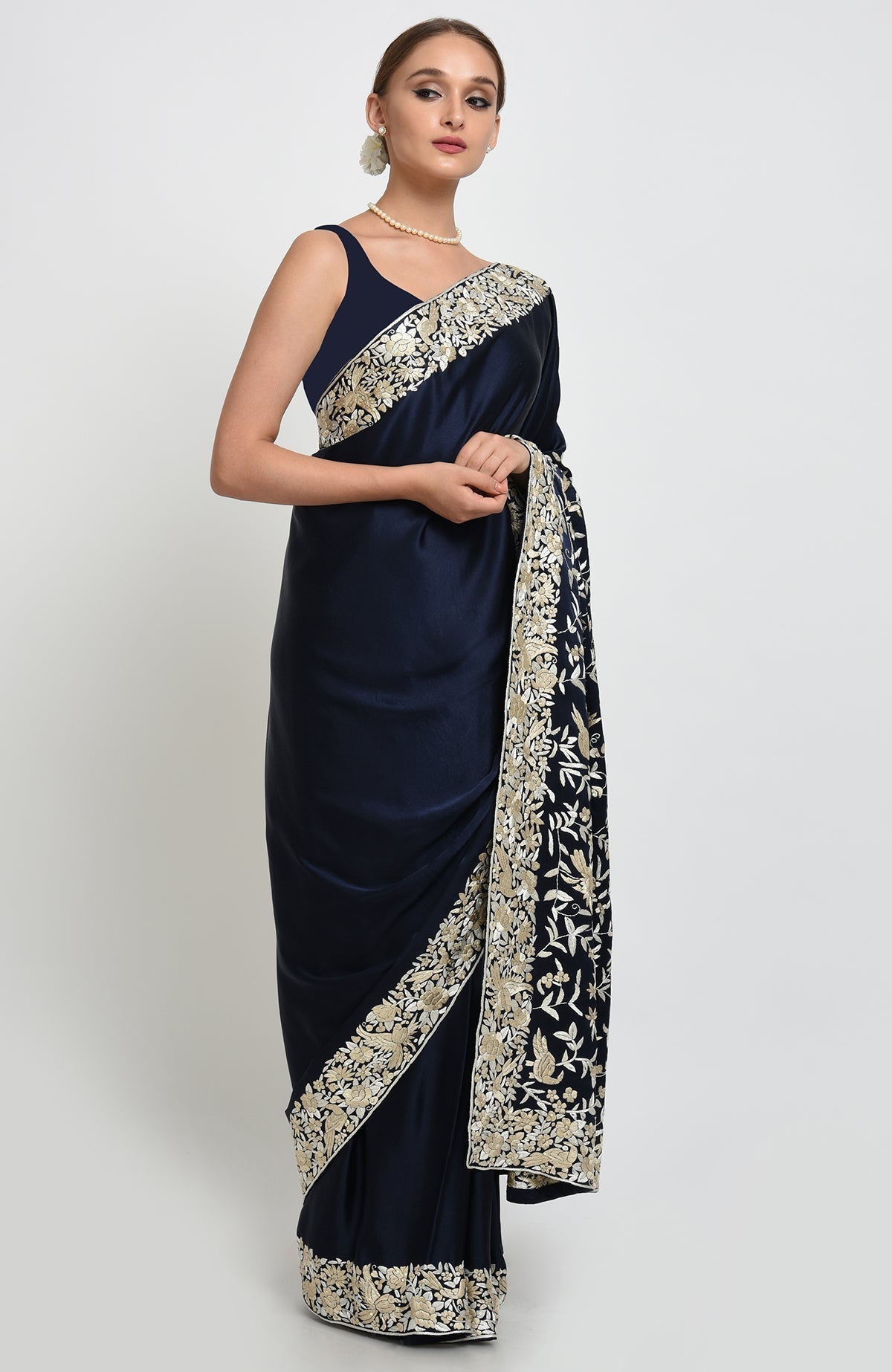 Navy blue-beige Parsi Gara hand embroidered saree with floral and bird motifs.
