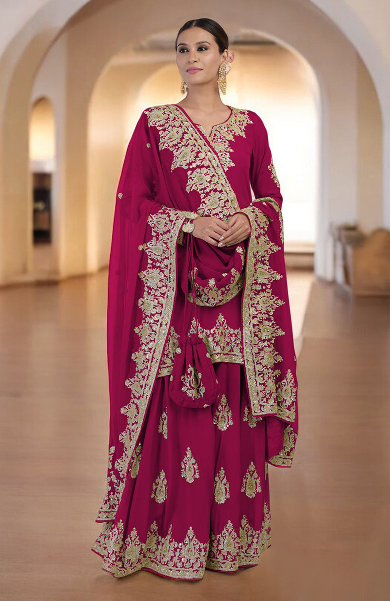 A woman models a magenta sharara set with gold embroidery and a matching potli bag.