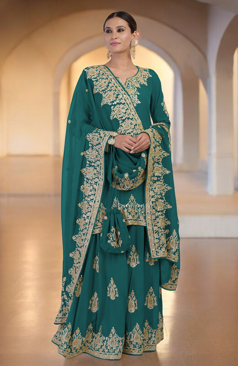 A woman models a teal sharara set with gold embroidery and a matching potli bag.