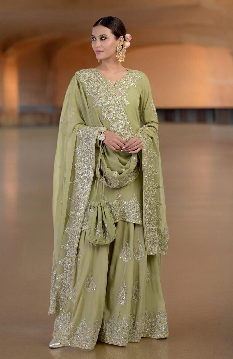 Bog green sharara set with gold Kashmiri tilla and zardozi hand embroidery.