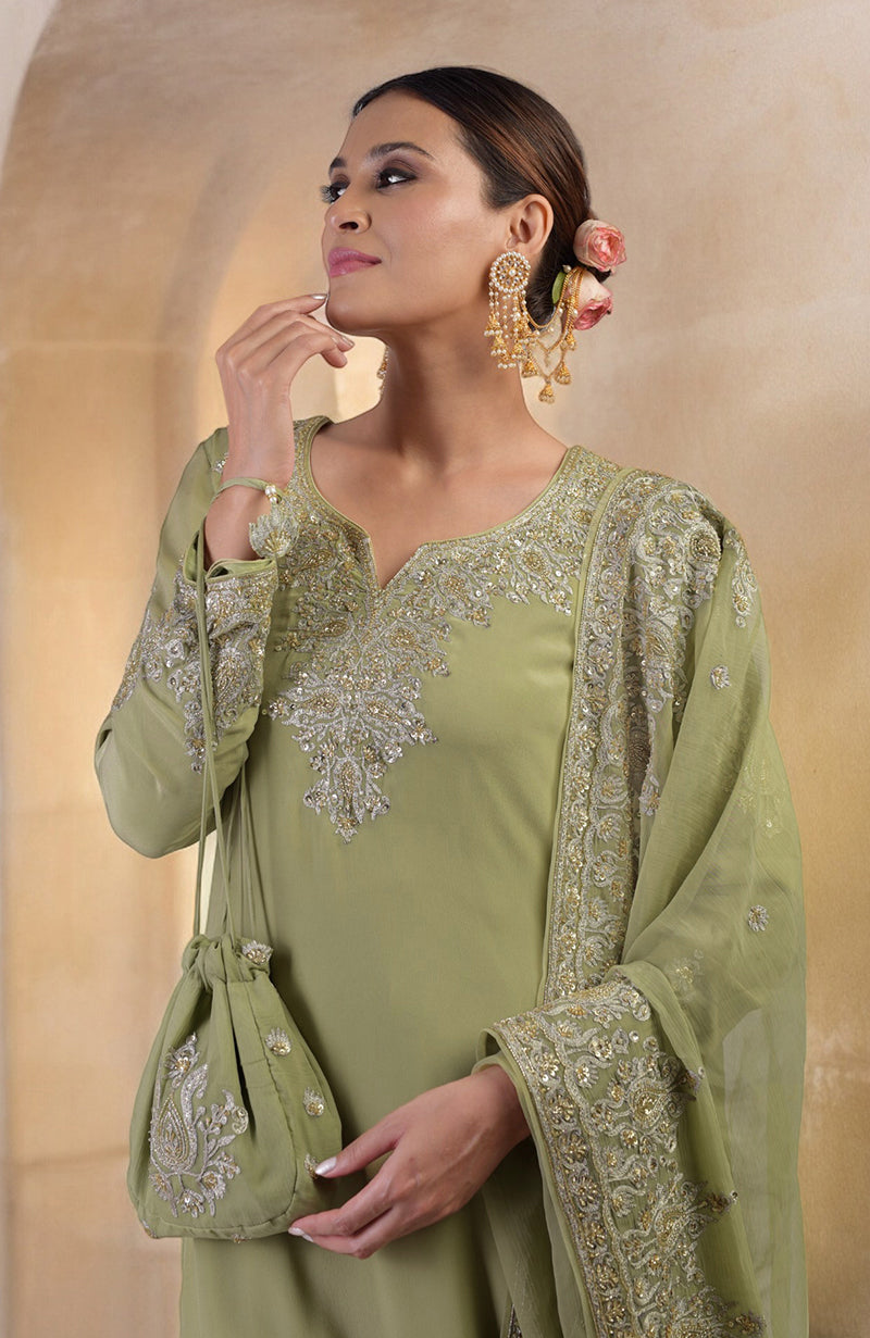 Bog green sharara set with gold Kashmiri tilla and zardozi hand embroidery.