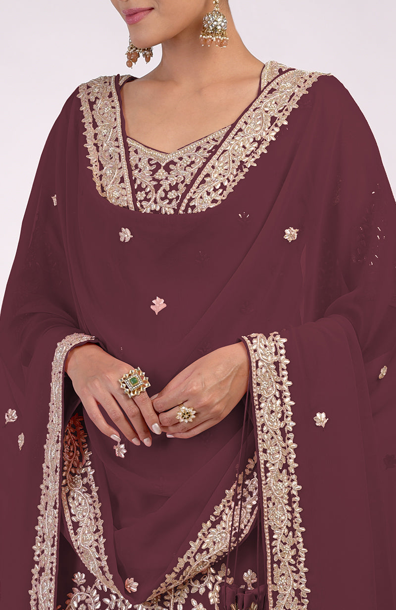 Burgundy sharara set with intricate marori gota patti and zardozi hand embroidery.