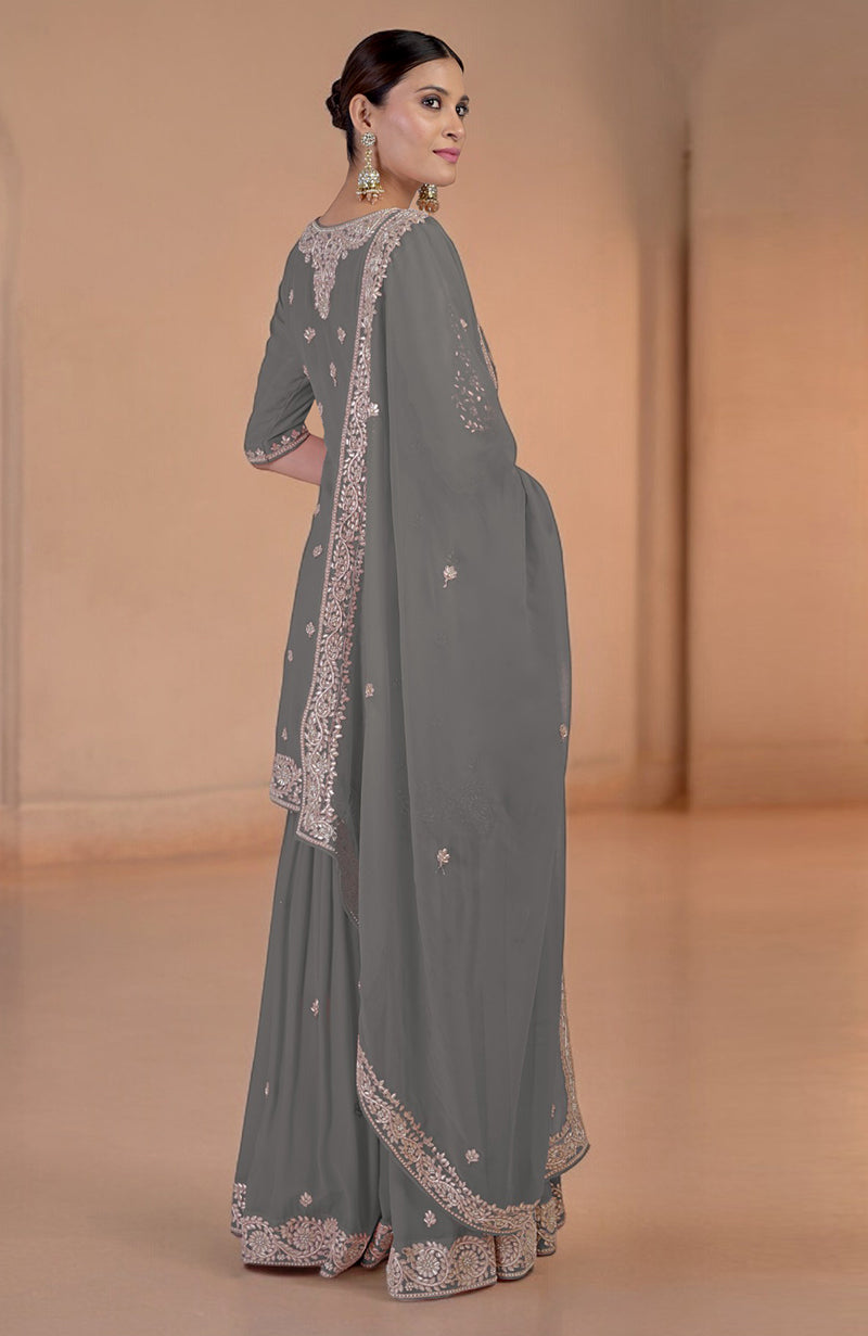 Grey sharara set with intricate rose gold embroidery and a matching dupatta.