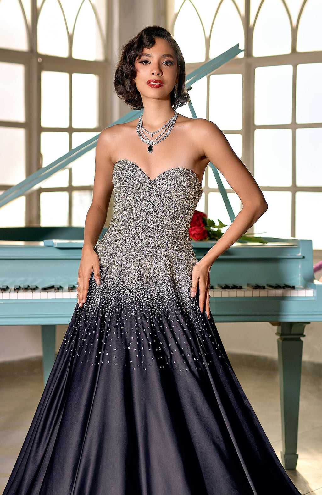 Midnight blue princess gown with crystal and pearl bead embroidery on satin fabric.